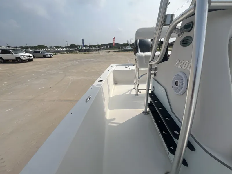 Slide: The Image of 2008 Pathfinder 2200 Tournament Edition boat on parking lot. - 28