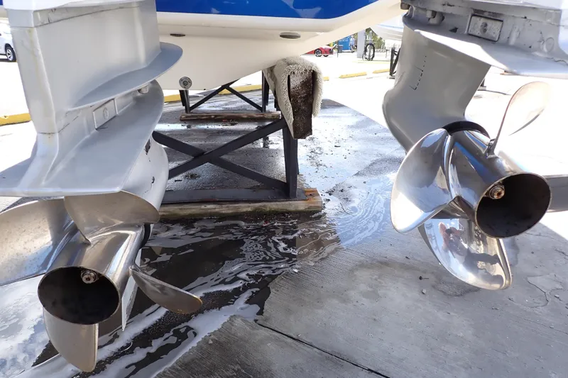Slide: The Image of Twin propellers of a 2022 Deep Impact 369 Sport boat on a stand. - 102