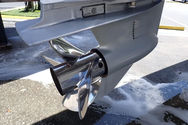 Slide: The Image of Close-up of a 2022 Deep Impact 369 Sport boat propeller, showcasing its sleek design. - 105