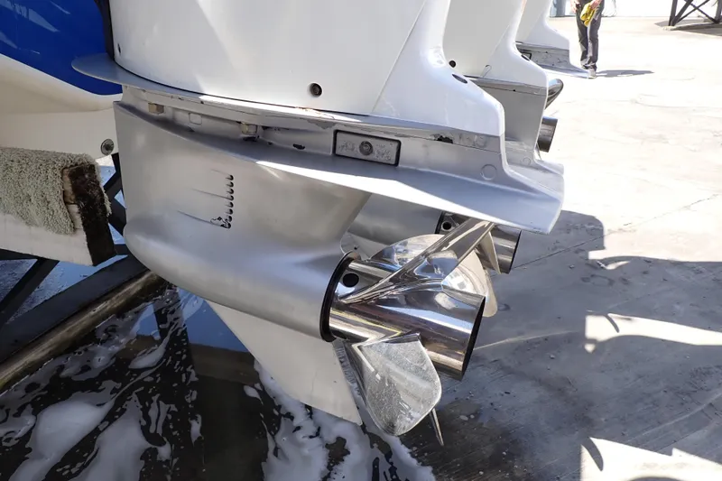 Slide: The Image of Close-up of 2022 Deep Impact 369 Sport boat propeller in a marina setting. - 108