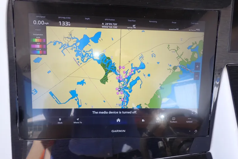 Slide: The Image of Garmin navigation display on 2022 Deep Impact 369 Sport boat, showing detailed marine map. - 21