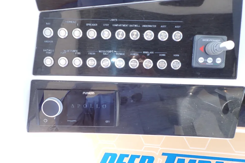 Slide: The Image of Control panel of 2022 Deep Impact 369 Sport boat with Fusion Apollo audio system. - 22