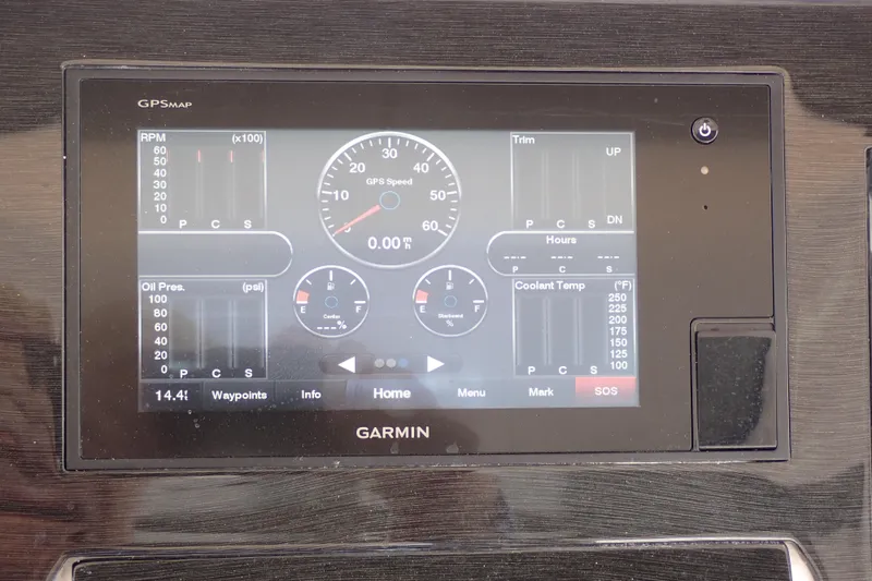 Slide: The Image of Garmin GPS display on 2022 Deep Impact 369 Sport boat dashboard. - 25