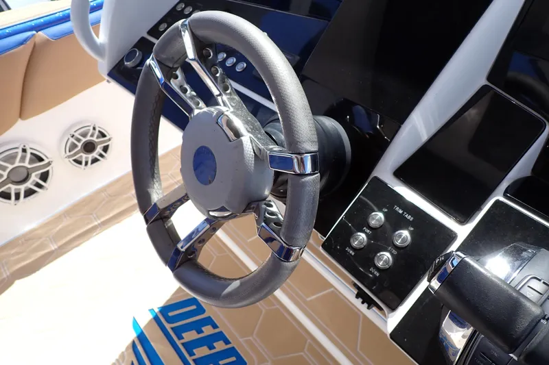 Slide: The Image of Steering wheel and controls of 2022 Deep Impact 369 Sport boat. - 29