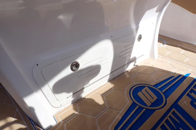 Slide: The Image of 2022 Deep Impact 369 Sport boat interior with custom flooring and storage compartment. - 30