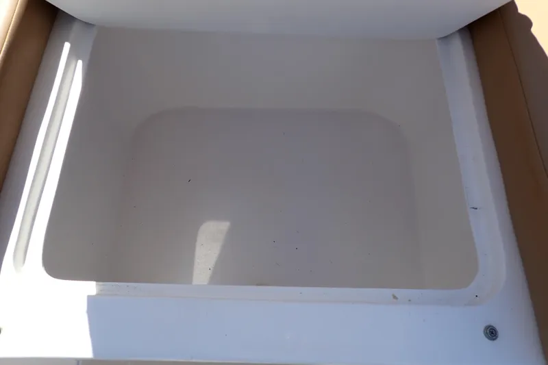 Slide: The Image of Open storage compartment on 2022 Deep Impact 369 Sport boat. - 50
