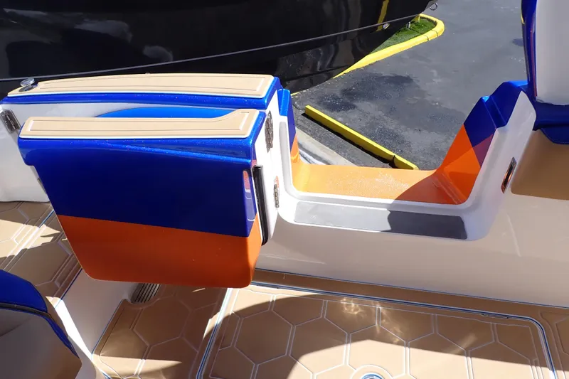 Slide: The Image of 2022 Deep Impact 369 Sport boat with vibrant blue and orange seating. - 60