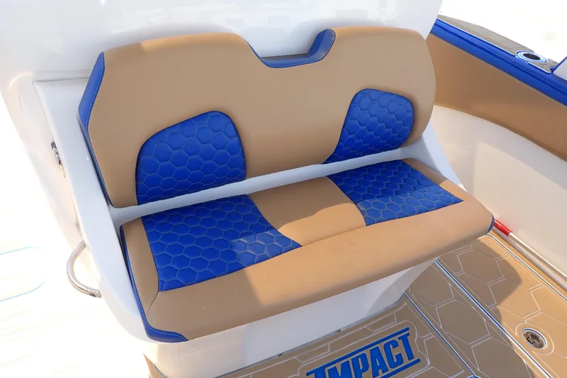 Slide: The Image of 2022 Deep Impact 369 Sport boat seat with blue and tan upholstery. - 63