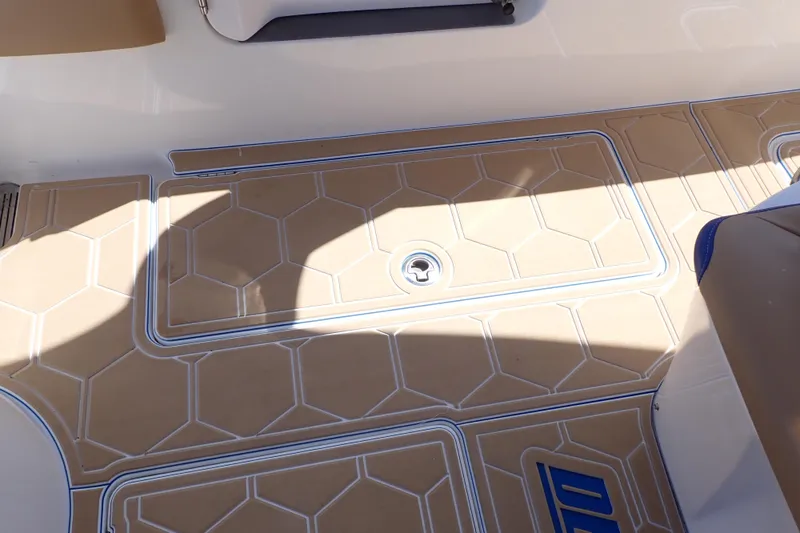 Slide: The Image of 2022 Deep Impact 369 Sport boat deck with hexagonal pattern and seating. - 65