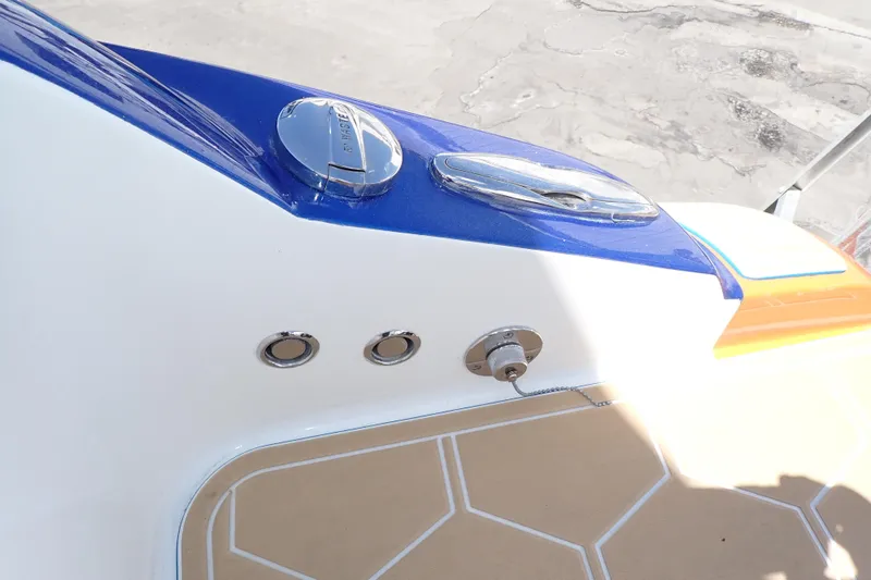 Slide: The Image of 2022 Deep Impact 369 Sport boat deck with fuel cap and fittings. - 74