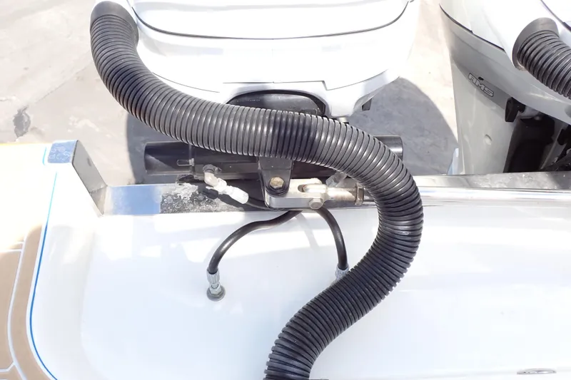 Slide: The Image of Close-up of 2022 Deep Impact 369 Sport boat engine components and hoses. - 87