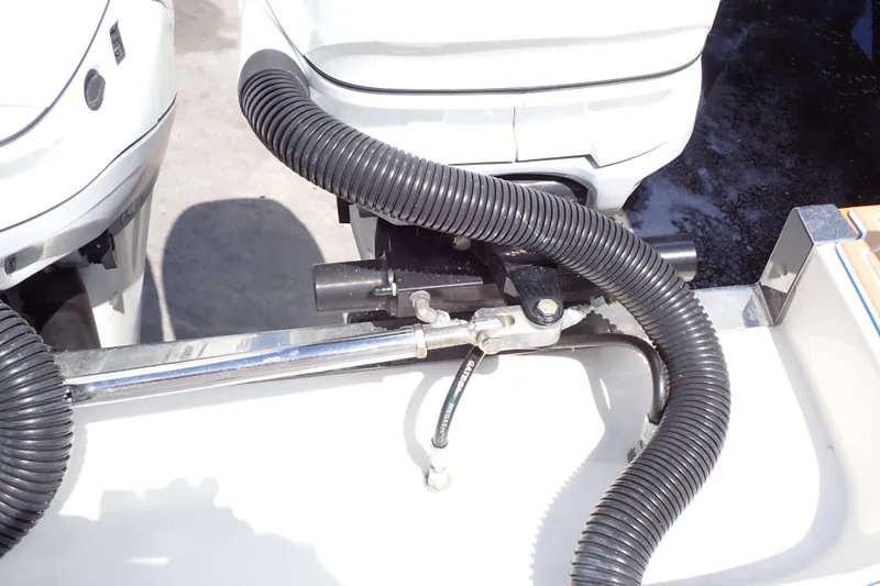 Slide: The Image of Close-up of 2022 Deep Impact 369 Sport boat engine components and hoses. - 89