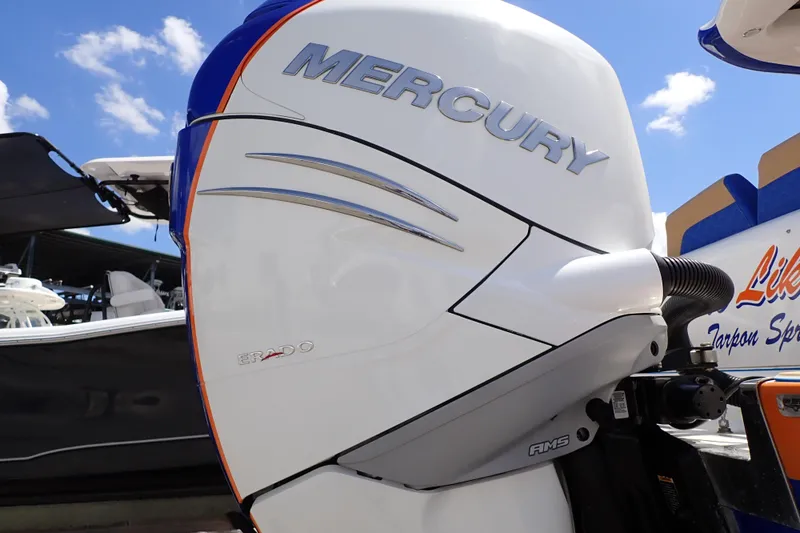 Slide: The Image of 2022 Deep Impact 369 Sport boat with Mercury engine under clear blue sky. - 97