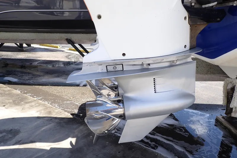 Slide: The Image of Close-up of 2022 Deep Impact 369 Sport boat propeller and outboard motor. - 99