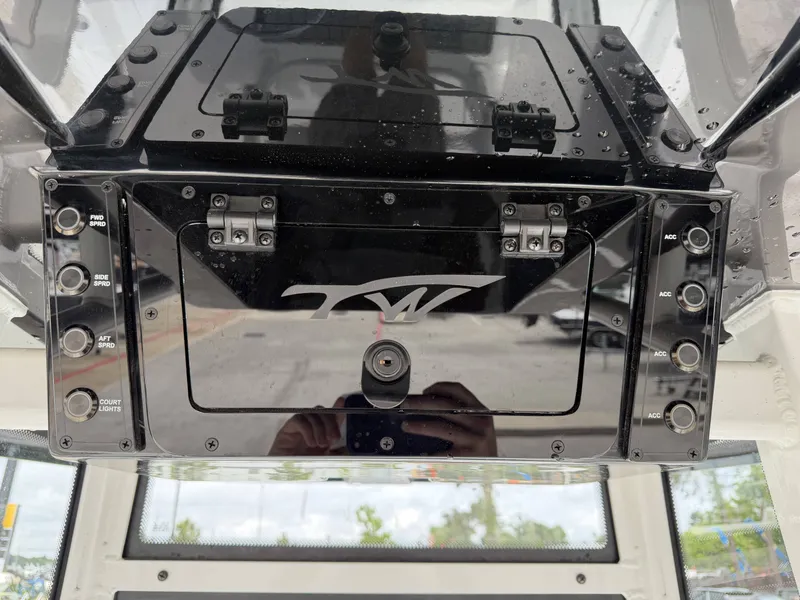 Slide: The Image of Dashboard of Tidewater 2210 Carolina Bay 2026 with switches. - 14