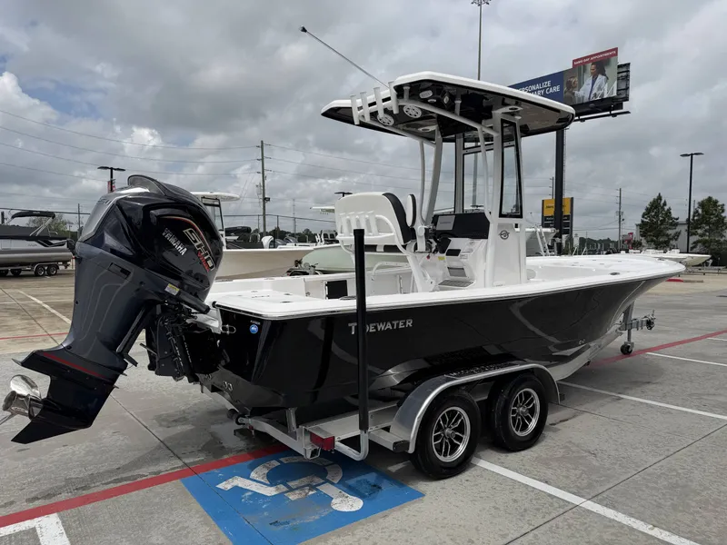 Slide: The Image of 2026 Tidewater 2210 Carolina Bay boat on trailer outdoors. - 31