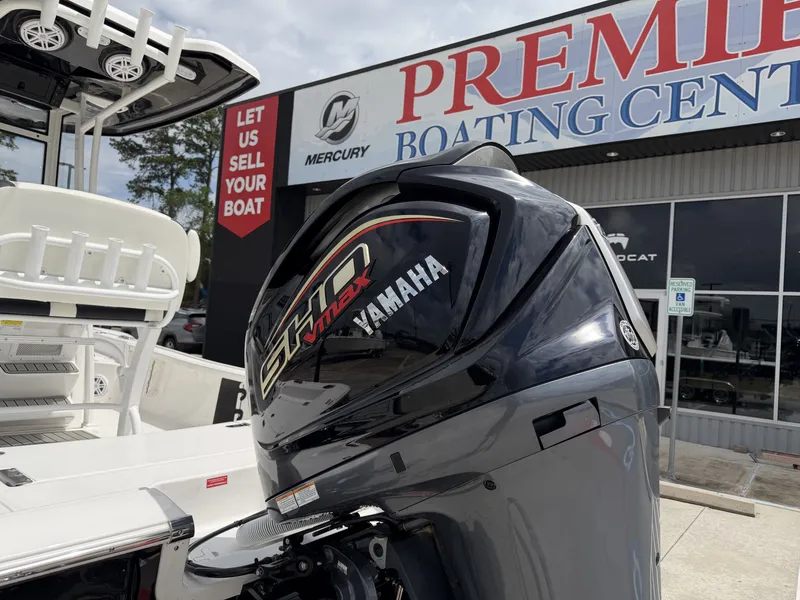 Slide: The Image of Tidewater 2210 Carolina Bay 2026 with Yamaha VMAX engine at Premier Boating Center. - 7
