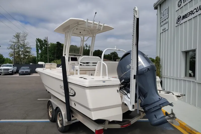 Slide: The Image of 2021 Robalo 226 Cayman boat on trailer with Yamaha outboard motor. - 3
