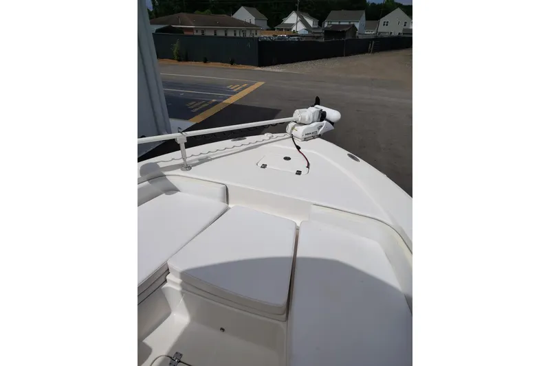 Slide: The Image of 2021 Robalo 226 Cayman boat deck with seating and trolling motor. - 8