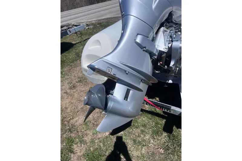 Slide: The Image of 2016 Brig Eagle 340 boat motor and propeller on grass. - 11