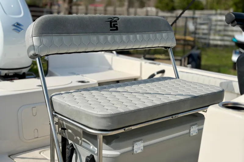 Slide: The Image of 2026 Carolina Skiff 21 LS boat seat with stylish gray upholstery and sturdy metal frame. - 3