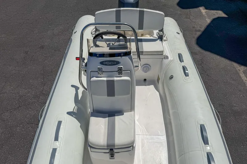 Slide: The Image of 2021 AB Inflatables Oceanus 14 VST boat, white interior, steering console view. - 11