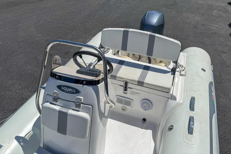 Slide: The Image of 2021 AB Inflatables Oceanus 14 VST boat interior with steering console and seating. - 12