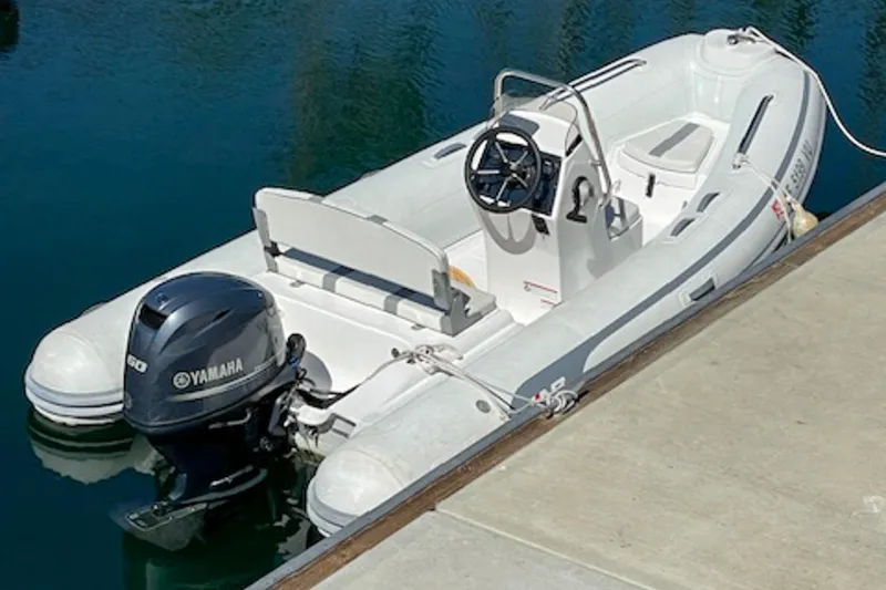 Slide: The Image of 2021 AB Inflatables Oceanus 14 VST boat docked with Yamaha outboard motor. - 3