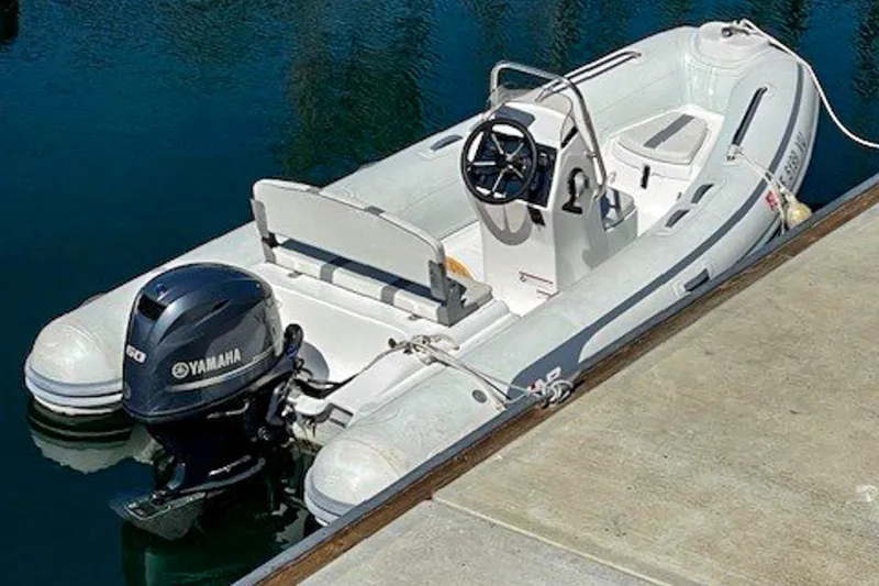 Slide: The Image of 2021 AB Inflatables Oceanus 14 VST boat docked with Yamaha outboard motor. - 5