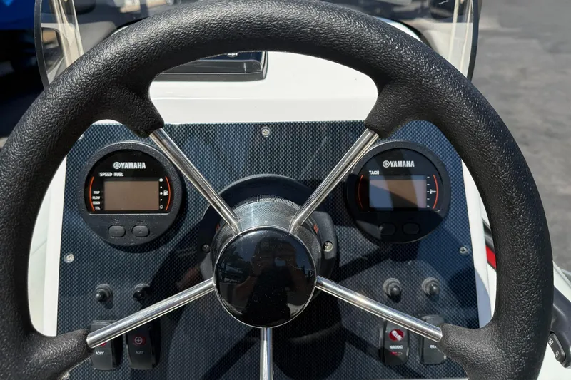 Slide: The Image of Steering wheel and dashboard of 2021 AB Inflatables Oceanus 14 VST boat. - 9