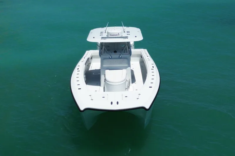 Slide: The Image of 2022 Freeman 34VH boat on clear turquoise water, aerial view. - 5
