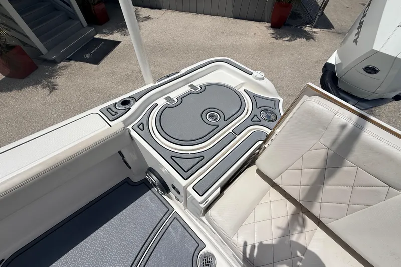 Slide: The Image of 2021 Blue Wave 2800 Makaira boat interior with seating and deck details. - 16