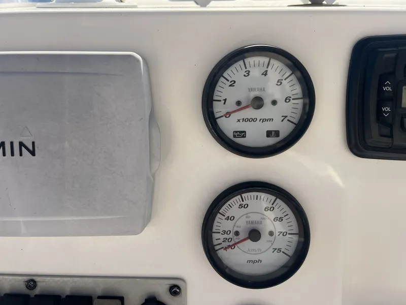 Slide: The Image of Dashboard of a Key West 189 FS boat, tachometer and speedometer. - 4