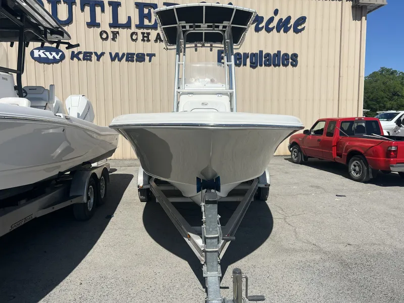 Slide: The Image of 2013 Key West 189 FS boat on trailer outside marine shop. - 8