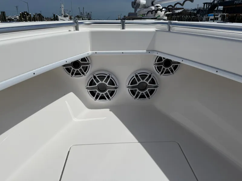 Slide: The Image of Speakers in the bow of a 2021 Contender 25 Tournament boat. - 10