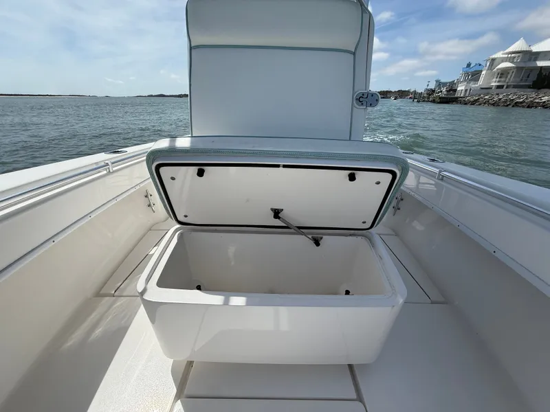Slide: The Image of Open storage compartment on Contender 25 Tournament boat, 2021 model. - 13