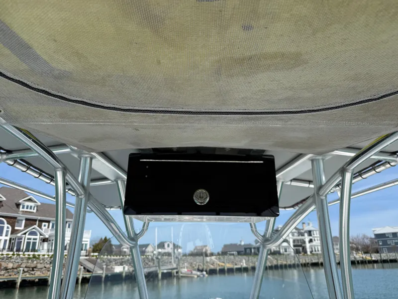 Slide: The Image of Contender 25 Tournament 2021 boat roof with harbor view. - 19