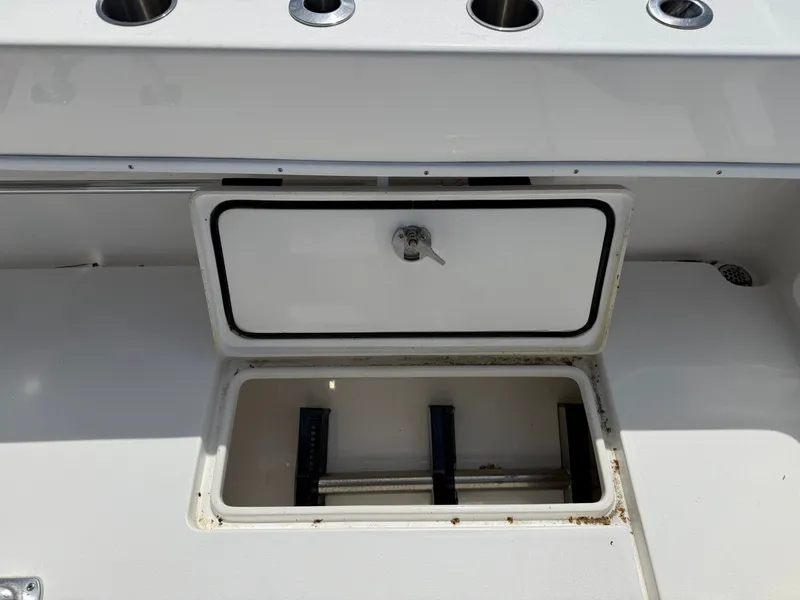Slide: The Image of 2021 Contender 25 Tournament boat, storage compartment with lid. - 22