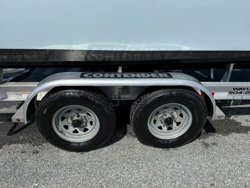 Slide: The Image of Contender 25 Tournament 2021 boat trailer with dual wheels. - 30