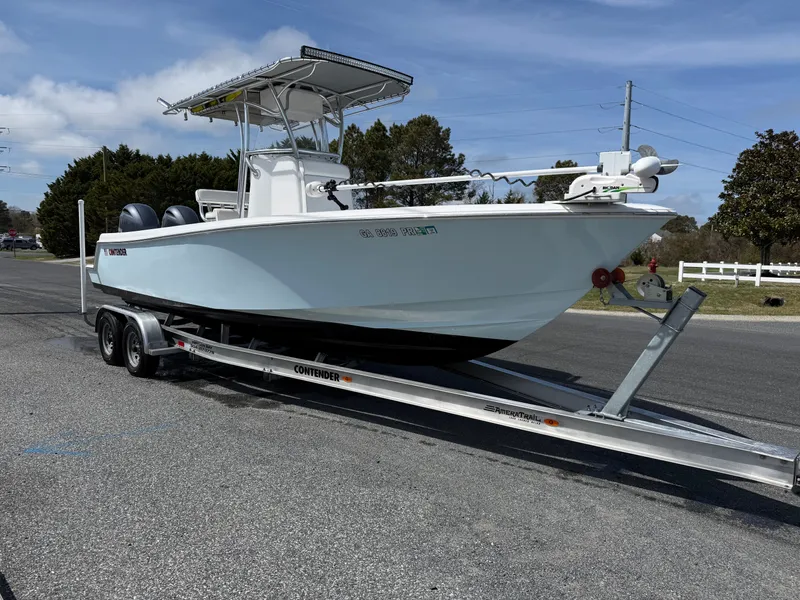 Slide: The Image of 2021 Contender 25 Tournament boat on trailer, side view. - 33
