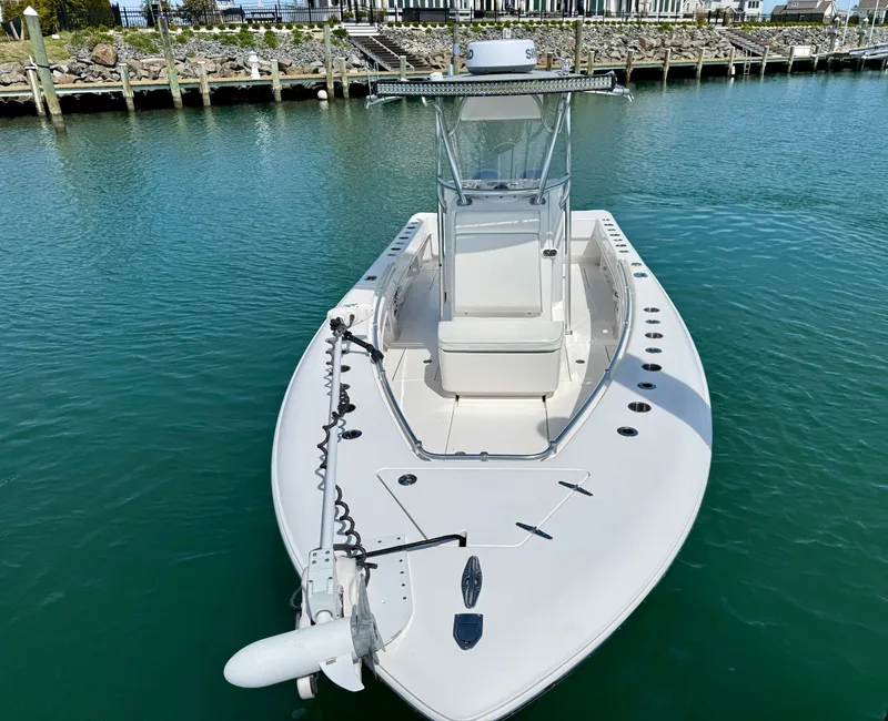 Slide: The Image of 2021 Contender 25 Tournament boat docked in harbor. - 6