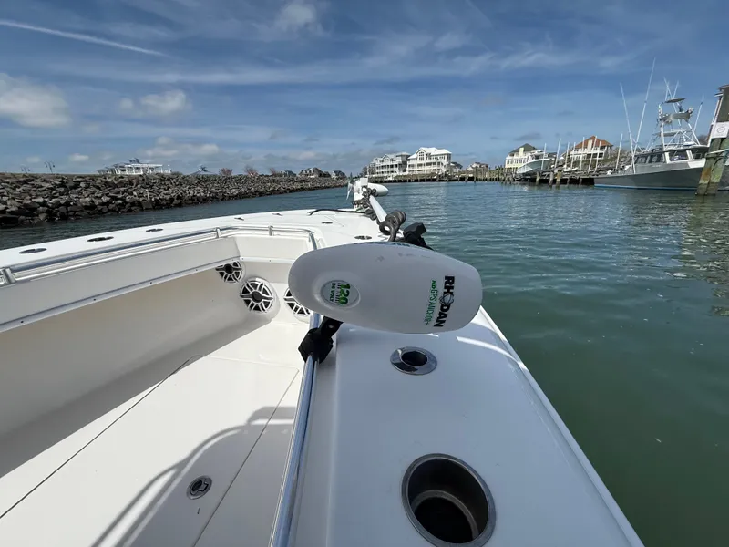Slide: The Image of Contender 25 Tournament 2021 boat in harbor with Rodan trolling motor. - 8