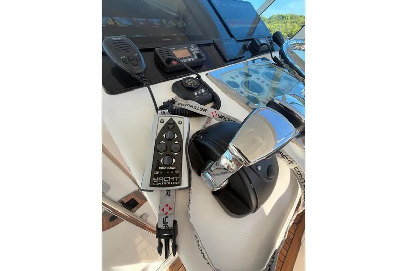 Slide: The Image of Control panel of a 2003 Cabo 35 Express yacht with navigation equipment. - 33