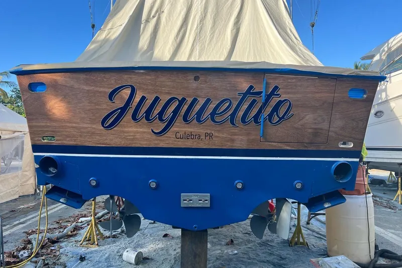 Slide: The Image of 2003 Cabo 35 Express boat named "Juguetito" in Culebra, Puerto Rico, docked for maintenance. - 6