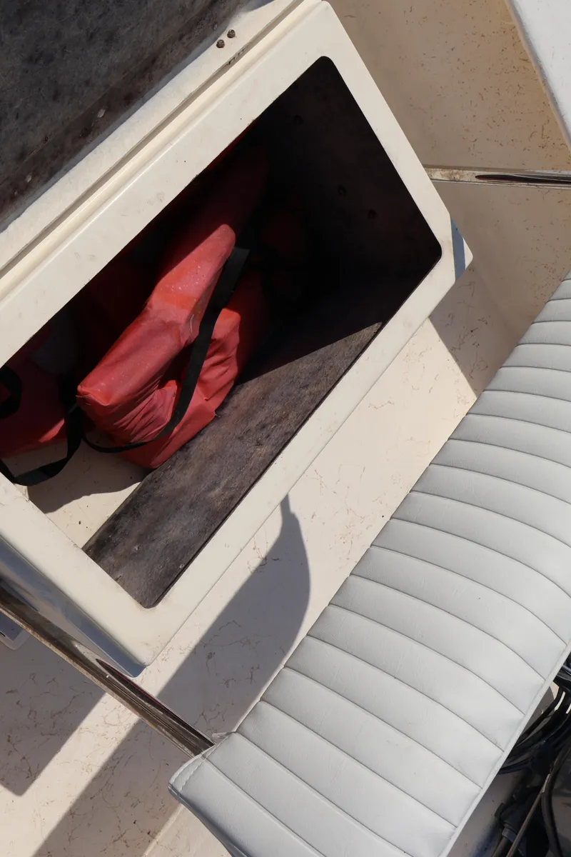 Slide: The Image of Jones Brothers Bateau 2000 with storage compartment and life jacket. - 10