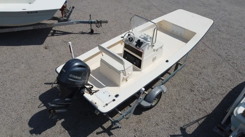 Slide: The Image of 2000 Jones Brothers Bateau with Yamaha engine on trailer. - 14