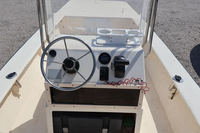 Slide: The Image of Steering console of a 2000 Jones Brothers Bateau boat. - 18