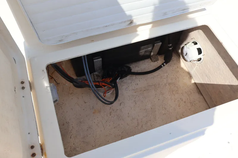 Slide: The Image of Open storage compartment of a 2000 Jones Brothers Bateau boat. - 19