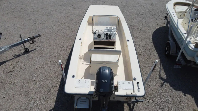 Slide: The Image of Aerial view of a 2000 Jones Brothers Bateau boat with outboard motor. - 3