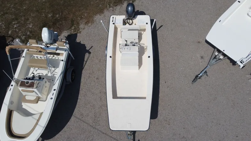 Slide: The Image of Aerial view of a 2000 Jones Brothers Bateau boat on a trailer. - 4